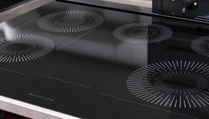 A closeup of an induction cooktop.