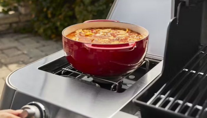 pot full of veggies on grill