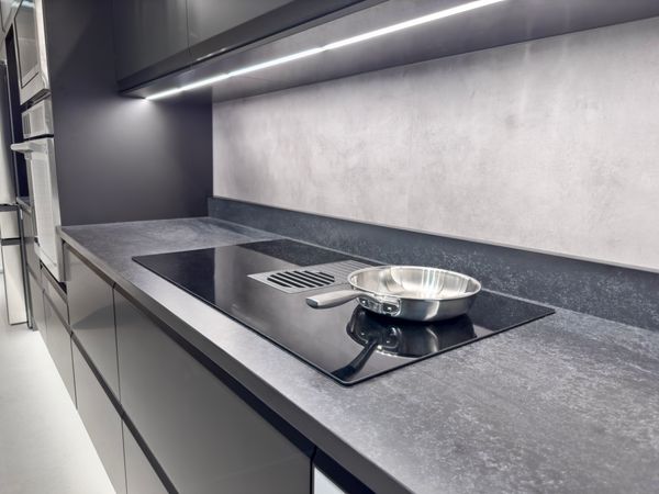 A luxury electric cooktop featured in a high end kitchen 