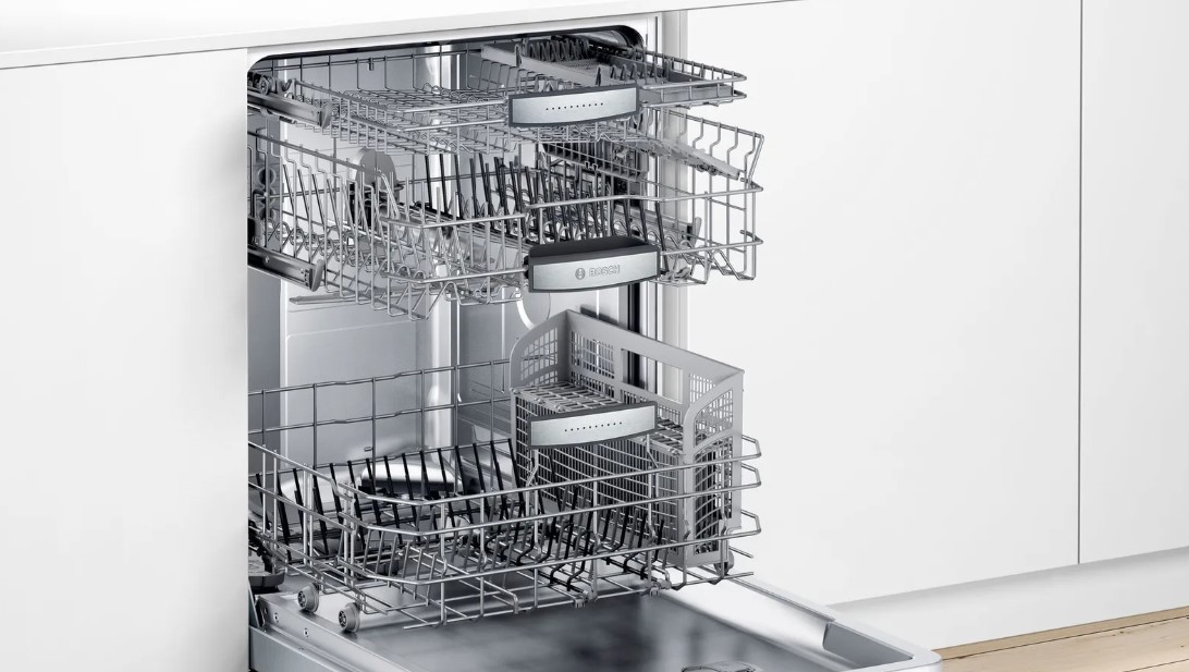 Bosch 800 series dishwasher with door ajar and racks pulled out