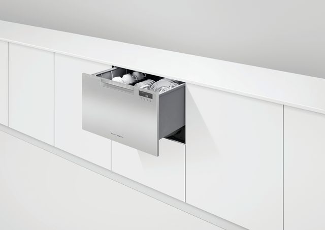 front view of a white drawer dishwasher in an all white kitchen