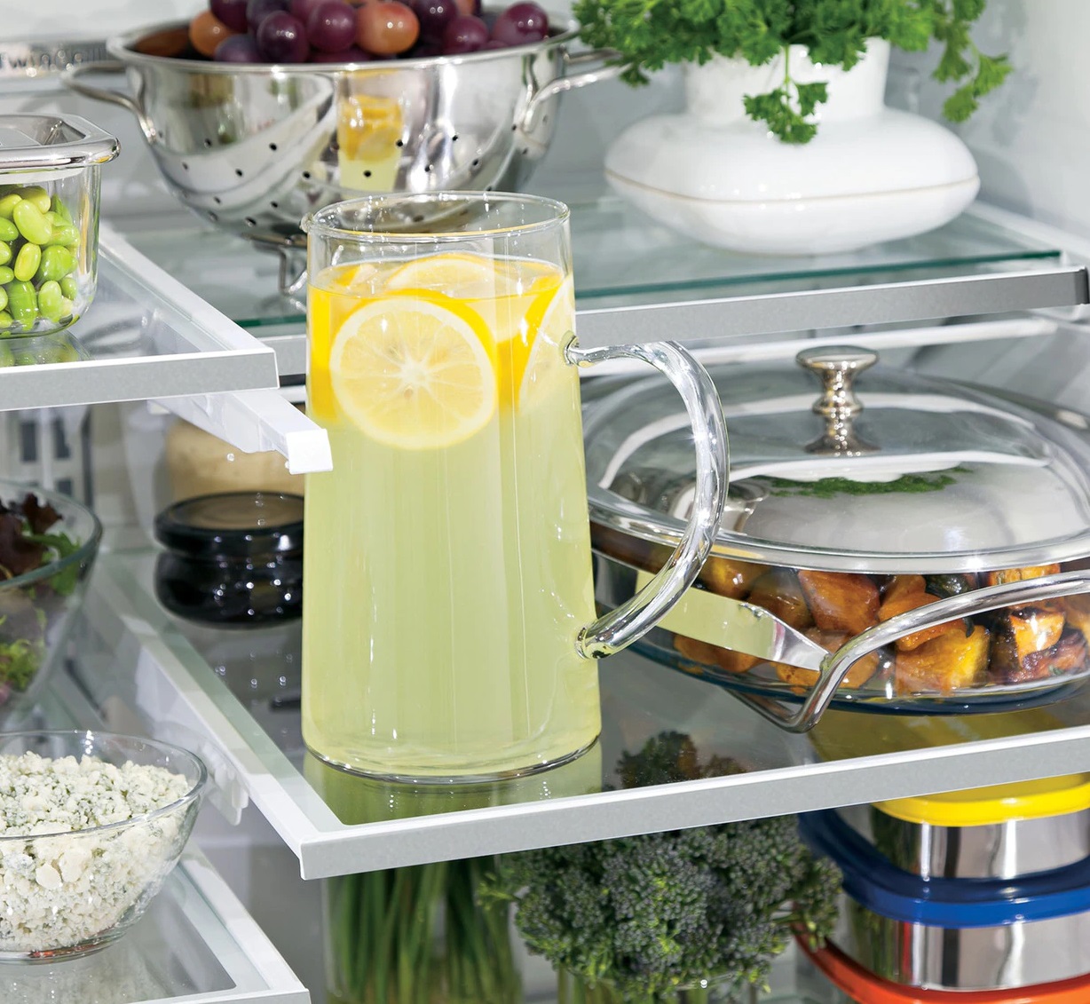 Assorted food inside GE Profile PFE28KMKES French door refrigerator