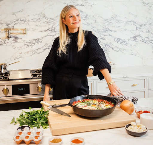 Credit: Monogram Actress Gwyneth Paltrow smiles as she cooks in her Monogram kitchen