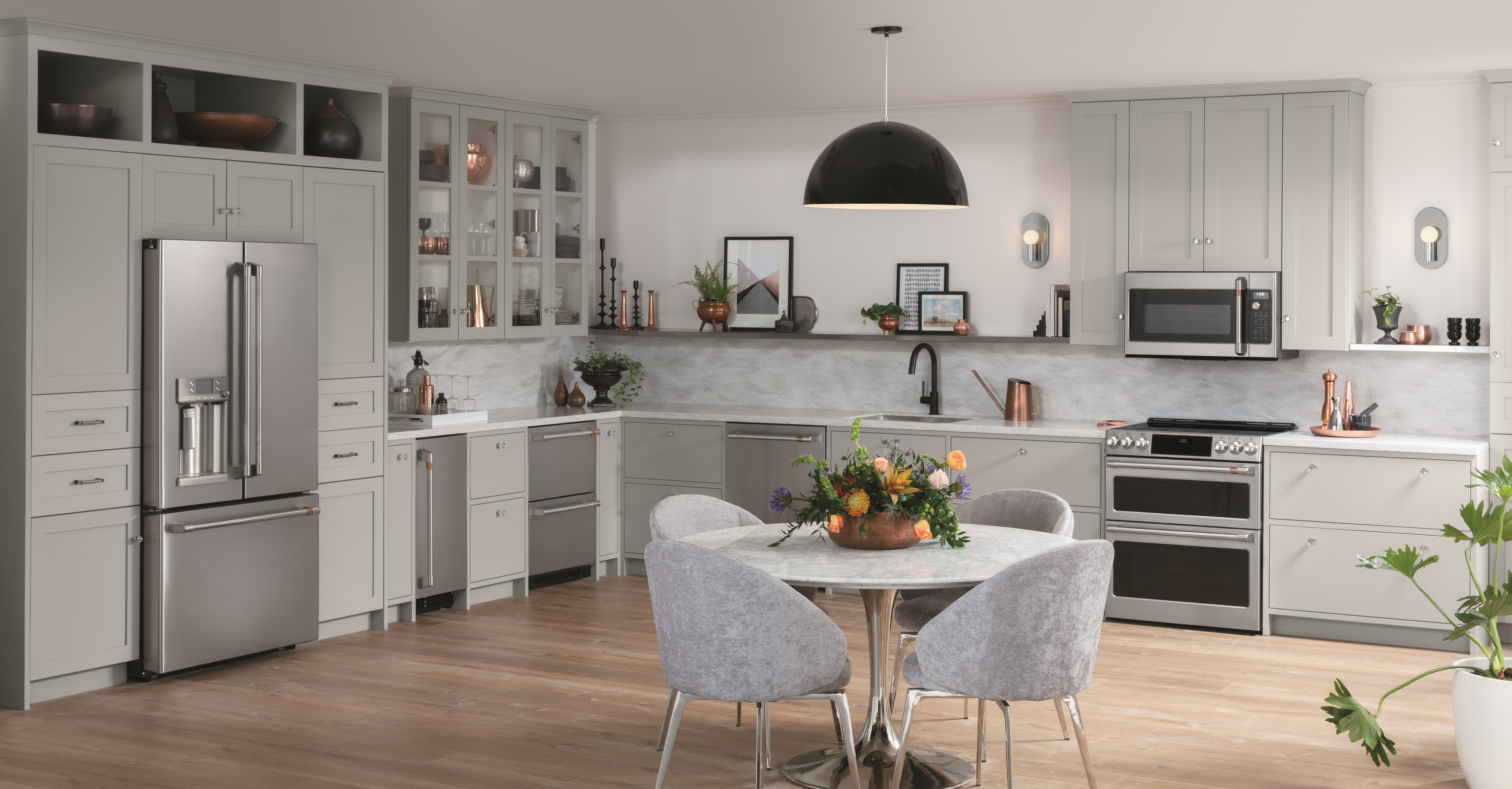 light colored kitchen design with cafe appliances 