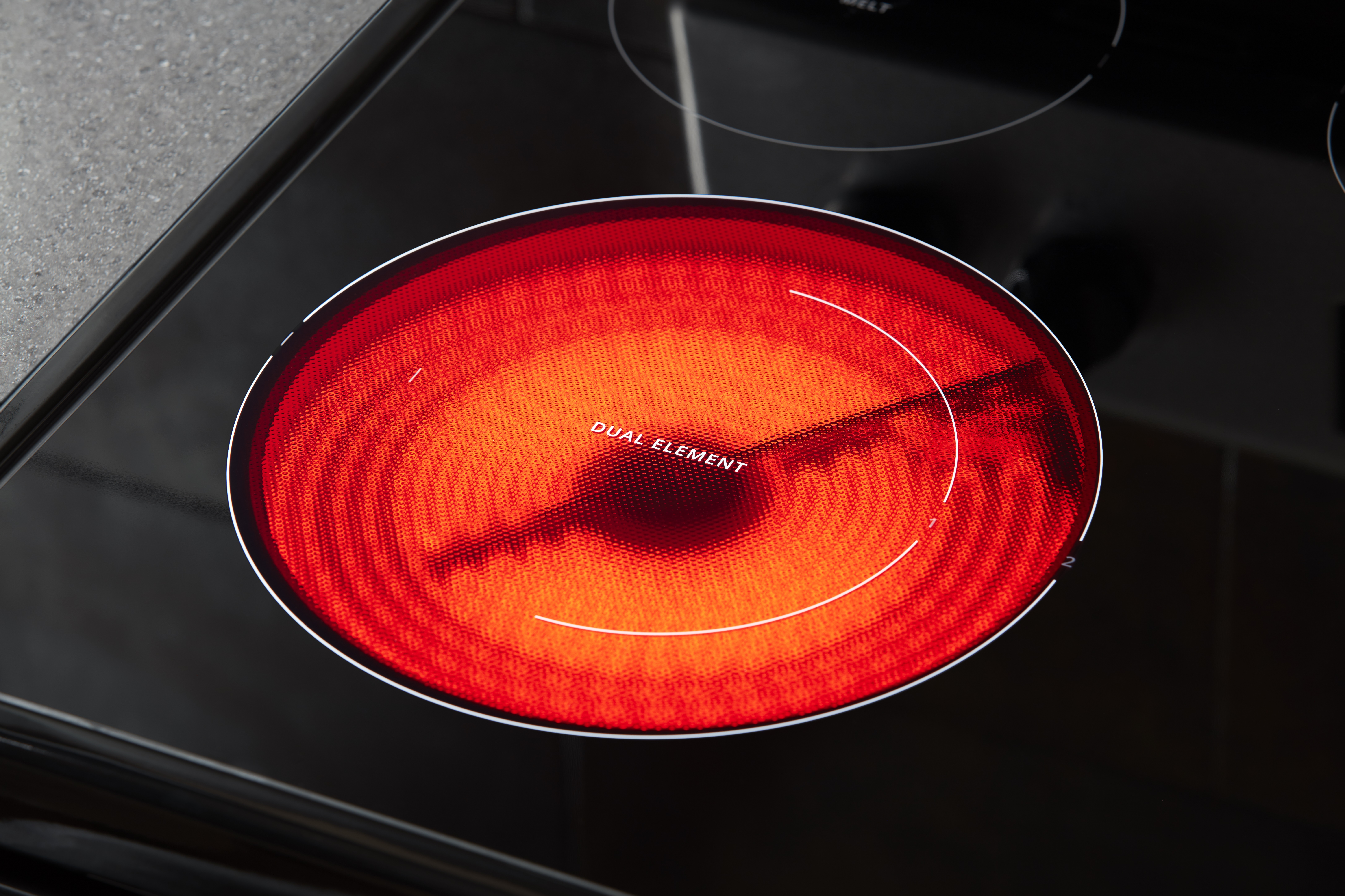 dual radiant element on whirlpool electric glass top range 