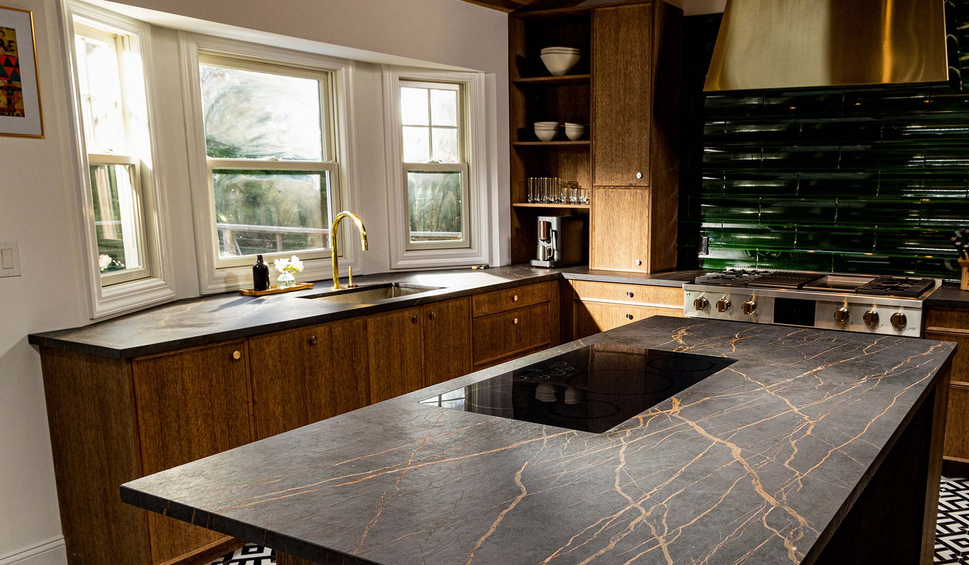 Wide shot of Marcus Samuelson’s kitchen featuring custom countertops and Monogram appliances