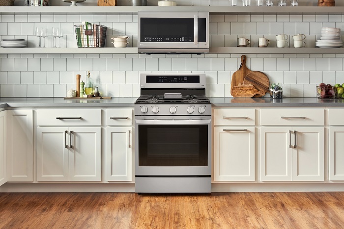 Modern stock kitchen with updated appliances. 