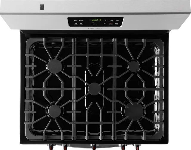 Overhead look at continuous grates on Frigidaire FFGF3054TS gas range 