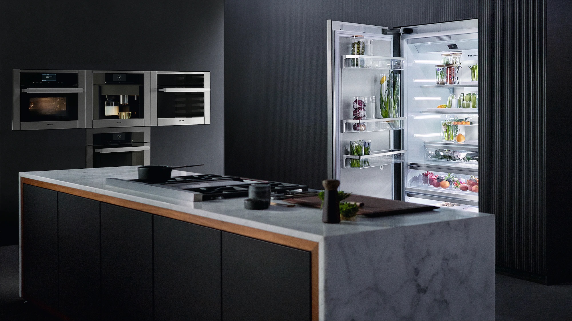 Visual of Miele wall ovens installed flush with built in coffee maker