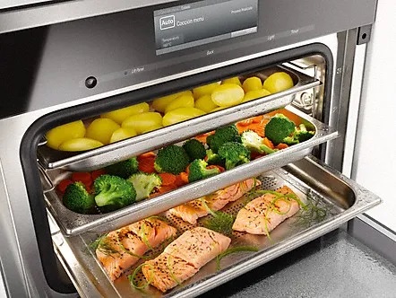 Miele steam oven with vegetables and salmon