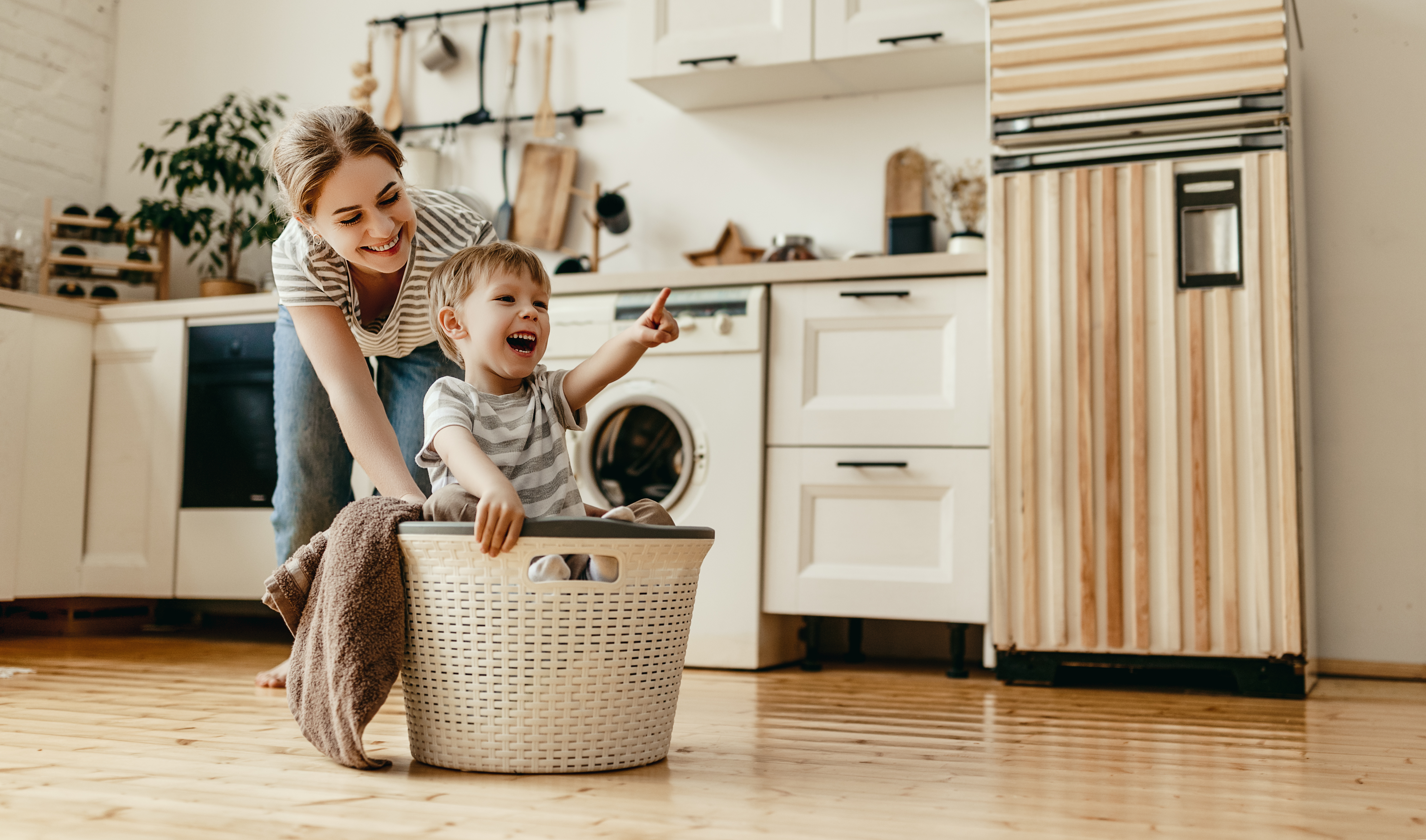 https://d6y5eqdcxq8w3.cloudfront.net/assets/blog/grand/mother-son-laundry-basket.jpg