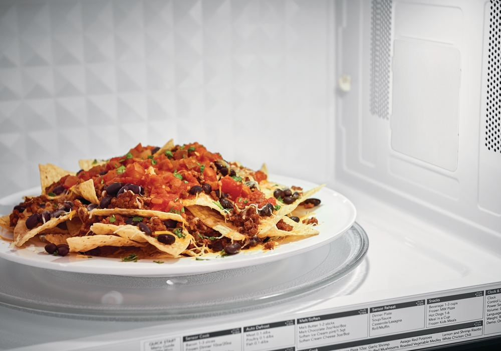 microwave with nachos inside