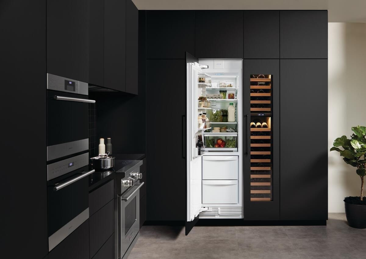 Showcase of Sub Zero column refrigerator and wine column in modern kitchen