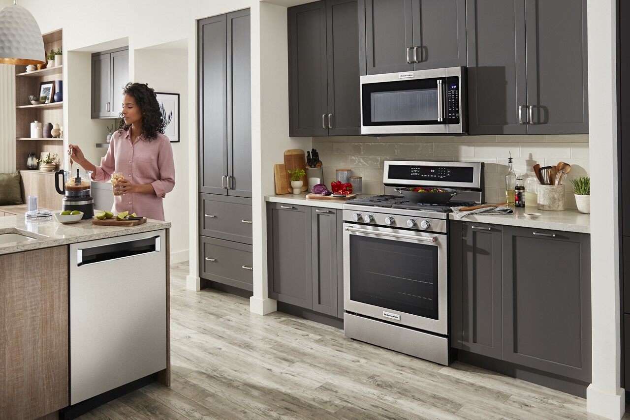 Wide shot of kitchen featuring KitchenAid KFGG500ESS gas range 