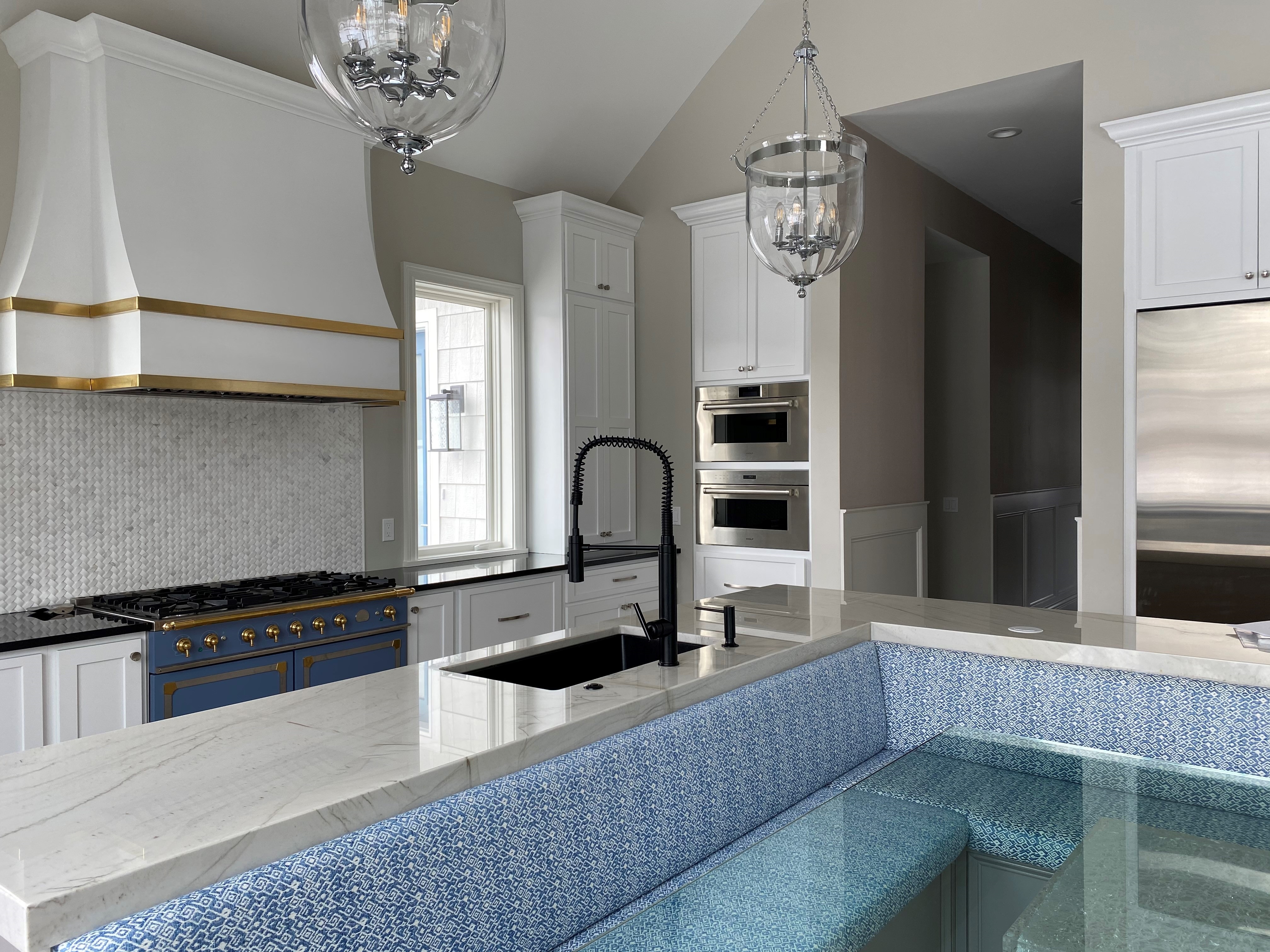 Wide shot of La Cornue Wolf luxury new kitchen build by Mark Gudenkauf