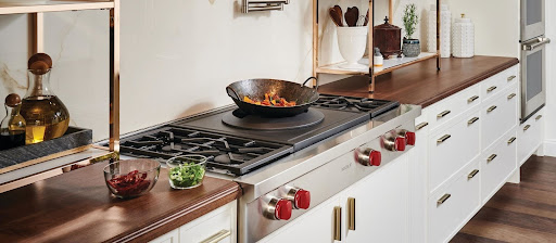 Wide shot of Wolf gas rangetop with wok burner