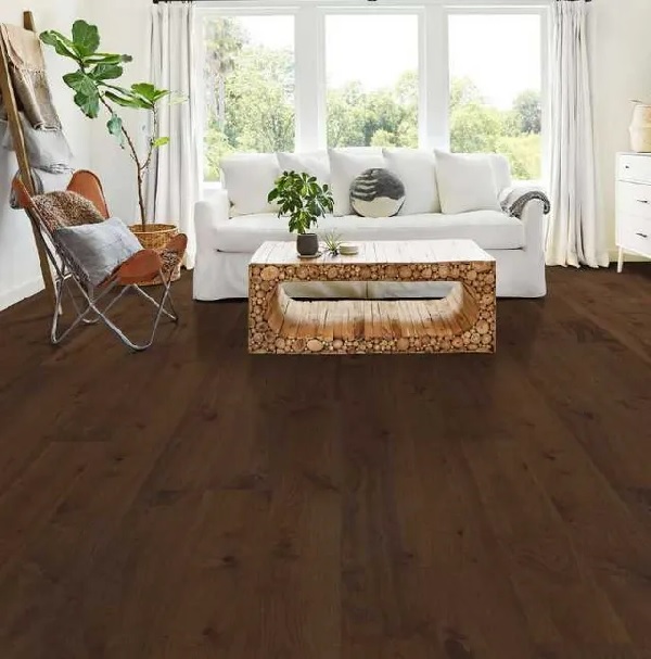 A modern living room featuring Shaw Floors Floorte hardwood flooring in a rich walnut finish 