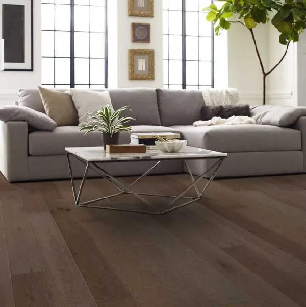 A living room featuring Shaw Floors Repel hardwood flooring in a high plains hide finish 
