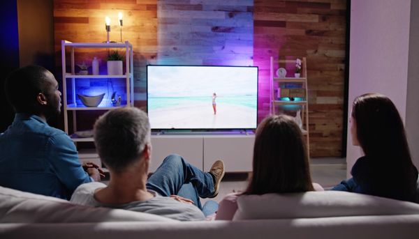 Friends Watching TV Together