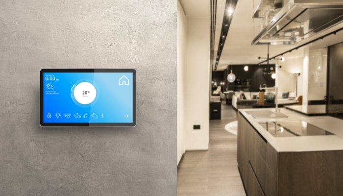 wall tablet showing temperature inside home