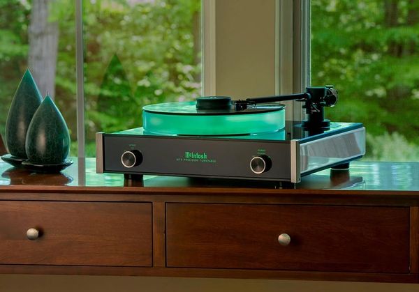 McIntosh MT5 turntable on a cabinet near a window