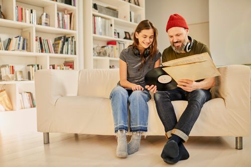 Listening to Music Together Father Daughter Listening to Music