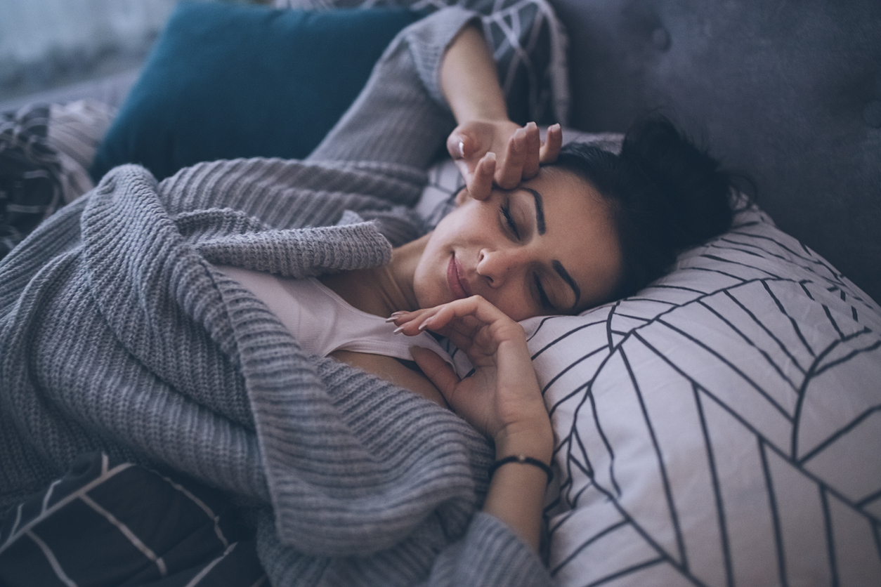 Woman Sleeping on Bed