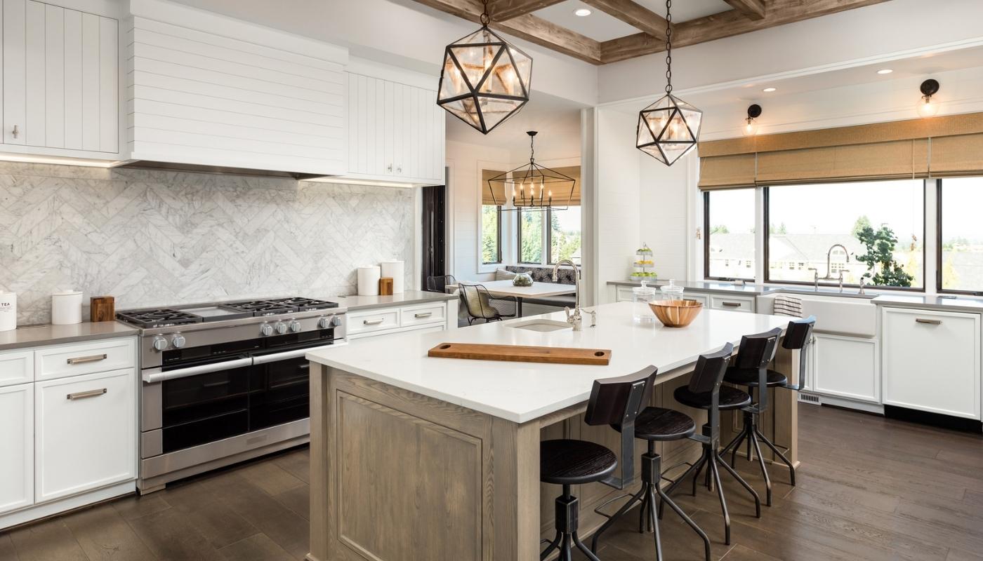 high-end farmhouse kitchen with 48 in stainless steel header