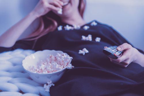 Watching a Movie with Popcorn Mess