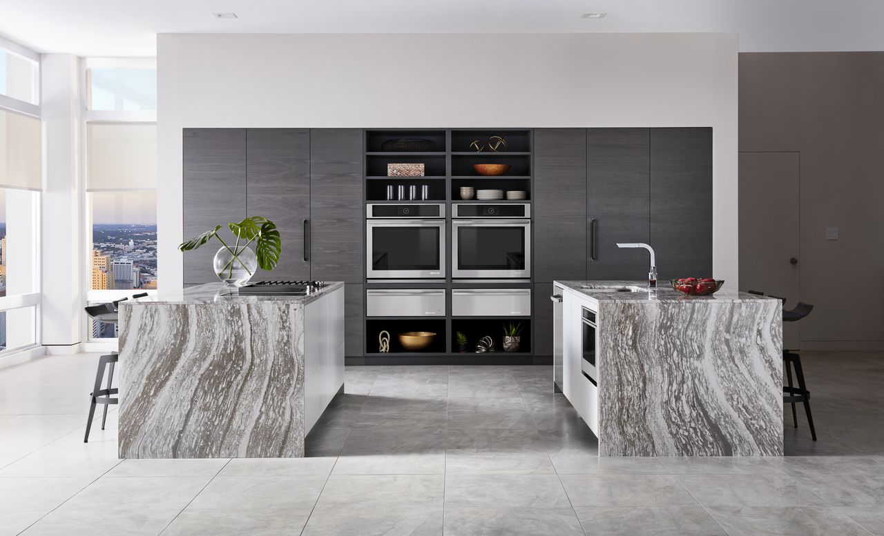 High end kitchen with marble islands and JennAir appliances