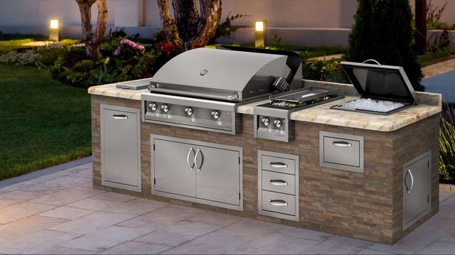 front view of a modern outdoor kitchen with various appliances
