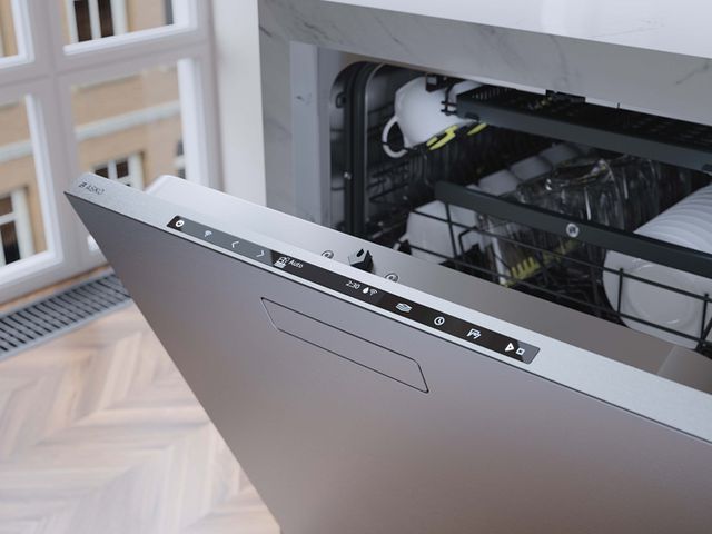 Close view of an ASKO dishwasher, slightly opened, showing the top panel controls and wifi-capability