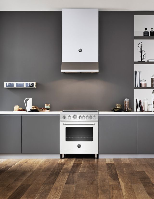 Front view of a modern kitchen with a white Bertazzoni electric range