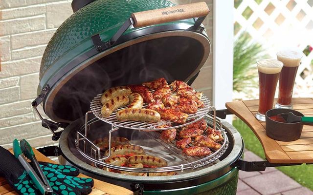 front view of food cooking in a Big Green Egg Kamado style grill