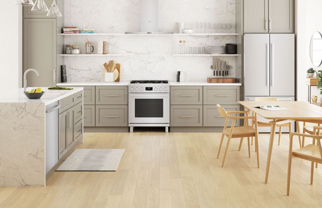 Front view of a modern kitchen with Bosch stainless steel appliances including a 30 inch gas range