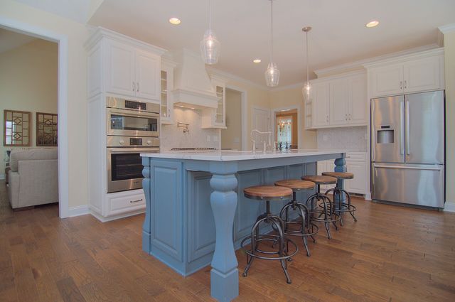 Front view of a modern kitchen with Bosch appliances and a microwave oven combo