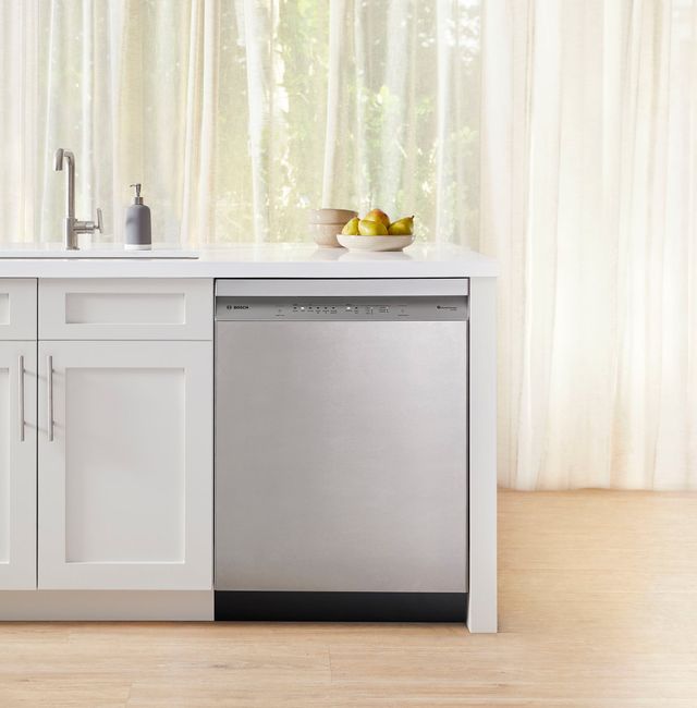Front view of a Bosch dishwasher in a modern kitchen.