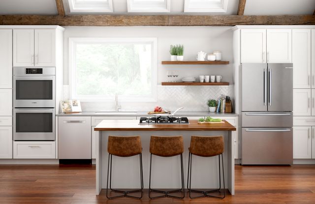 front view of a modern kitchen with stainless steel bosch appliances