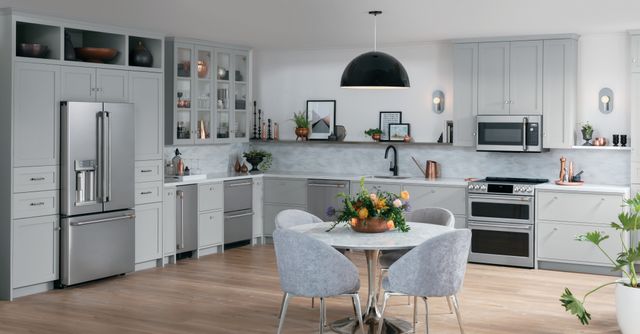 front view of a modern kitchen with stainless steel Cafe appliances