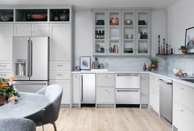 front view of a modern kitchen with stainless steel cafe appliances