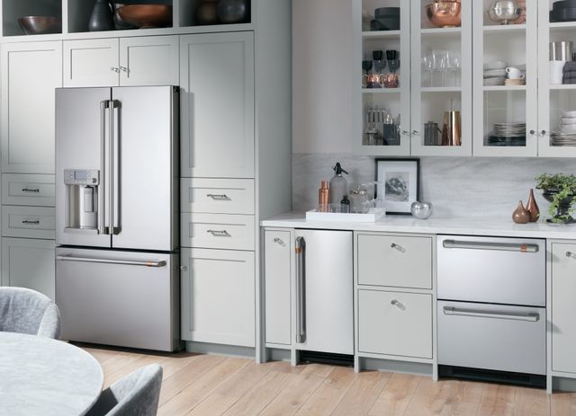 front view of a modern kitchen with stainless steel cafe appliances including a french door refrigerator, wine cooler, and drawer dishwasher