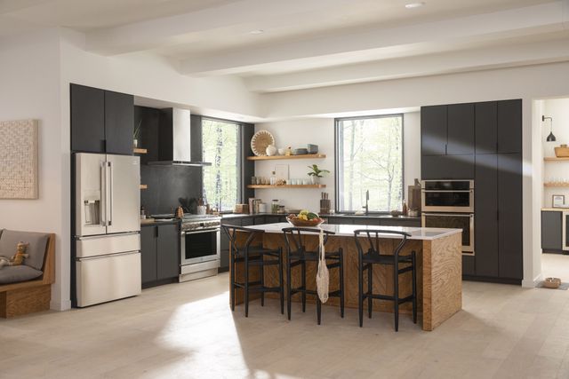 front view of a modern kitchen with stainless steel electrolux appliances