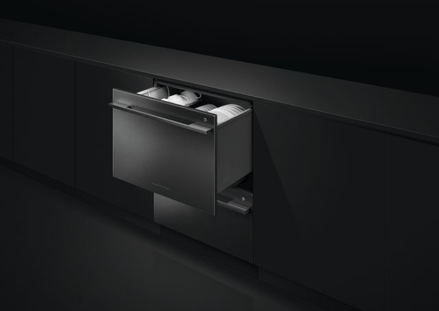 Credit: Fisher and Paykel Front view of a Fisher and Paykel double drawer dishwasher in an all black kitchen