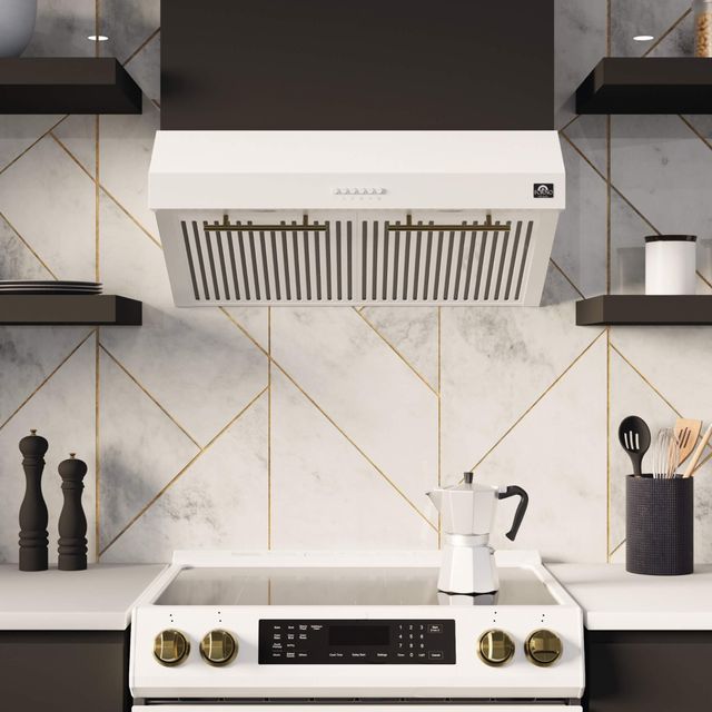 Front view of a modern kitchen with a Forno white electric range and hood