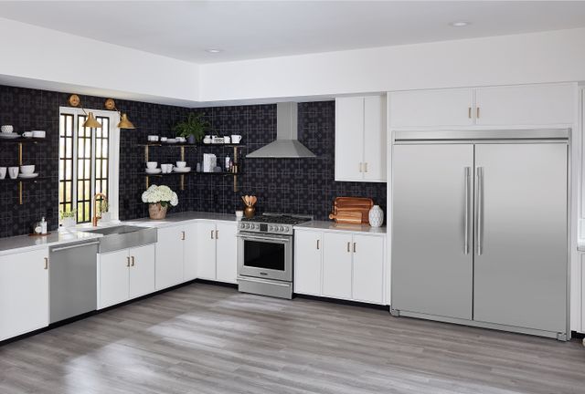 Front view of a modern kitchen with Frigidaire Pro Series appliances.