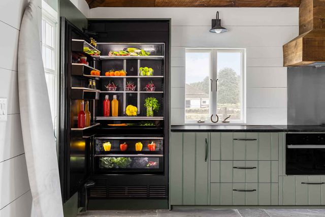 Front view of a opened column JennAir refrigerator