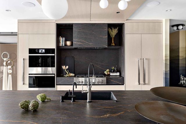 Front view of a modern kitchen with a JennAir kitchen appliance package