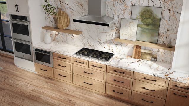 front view of a modern kitchen with a JennAir gas cooktop