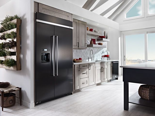 Front view of a KitchenAid side by side black and stainless steel refrigerator.