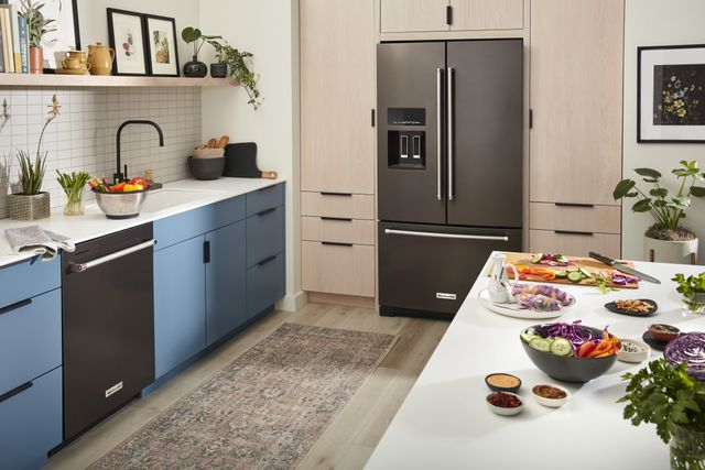 front view of a modern kitchen with a black stainless steel KitchenAid french door refrigerator